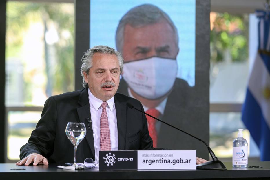 Handout picture released by Argentina's Presidency showing Argentine President Alberto Fernandez announcing new measures to soften the lockdown against the spread of the new coronavirus, COVID-19 in the capital Buenos Aires and its outskirts, at Olivos Presidential Residence in Olivos, Province of Buenos Aires, on July 17, 2020. - The pandemic has killed at least 590,132 people worldwide since it surfaced in China late last year and more than 13.8 million have been infected, according to an AFP tally at 1100 GMT on Friday based on official sources. (Photo by Esteban COLLAZO / Argentinian Presidency / AFP) / RESTRICTED TO EDITORIAL USE - MANDATORY CREDIT "AFP PHOTO / ARGENTINA'S PRESIDENCY / ESTEBAN COLLAZO" - NO MARKETING - NO ADVERTISING CAMPAIGNS - DISTRIBUTED AS A SERVICE TO CLIENTS